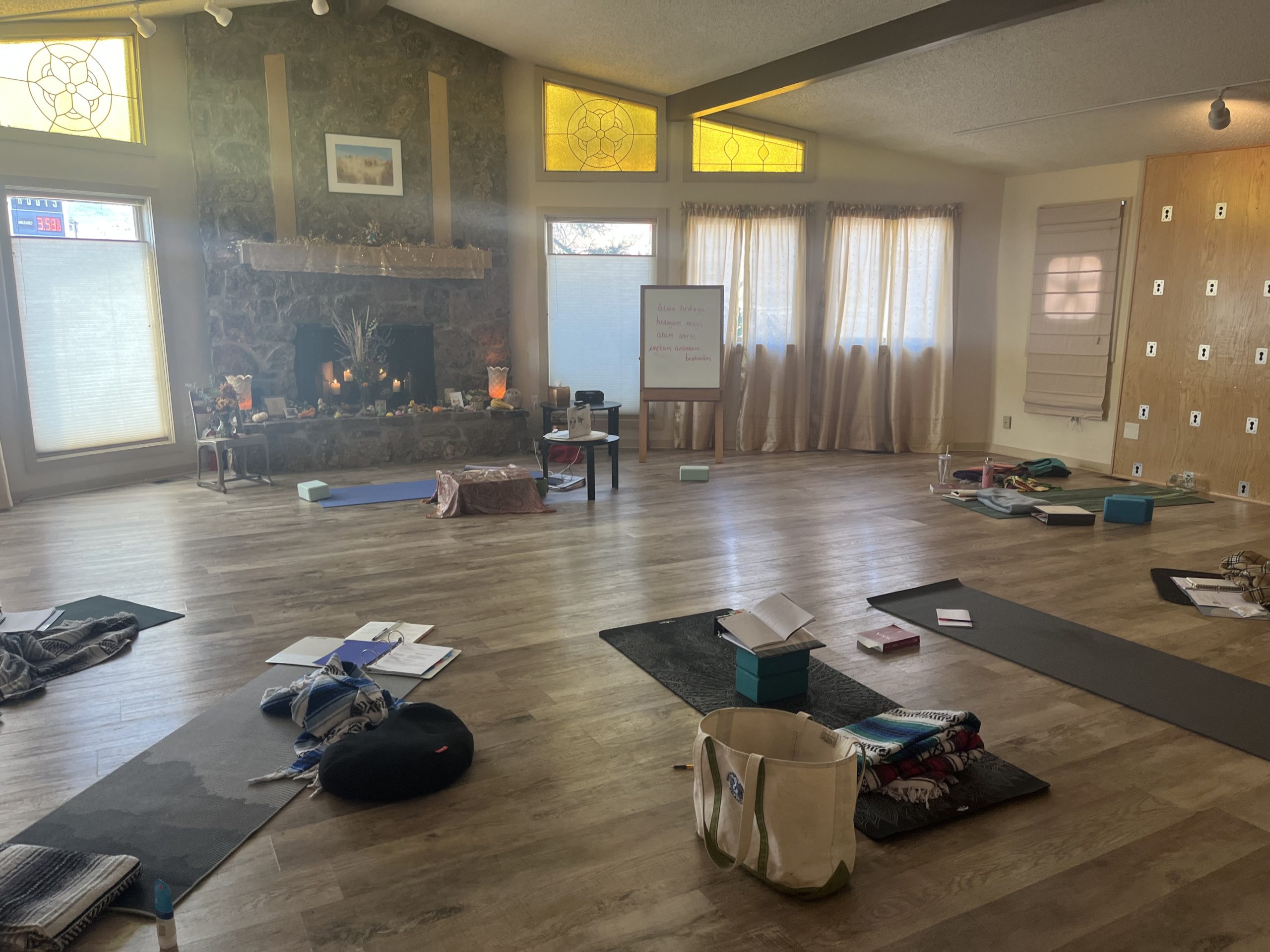 yoga studio with mats laid out on the floor